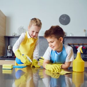 children cleaning kitchen